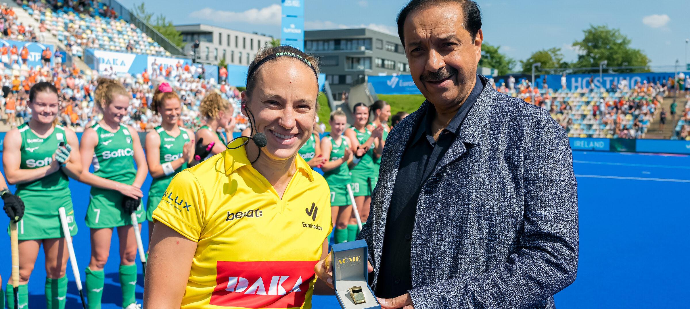 Delforge and Makar honoured with golden whistles for major umpiring milestones